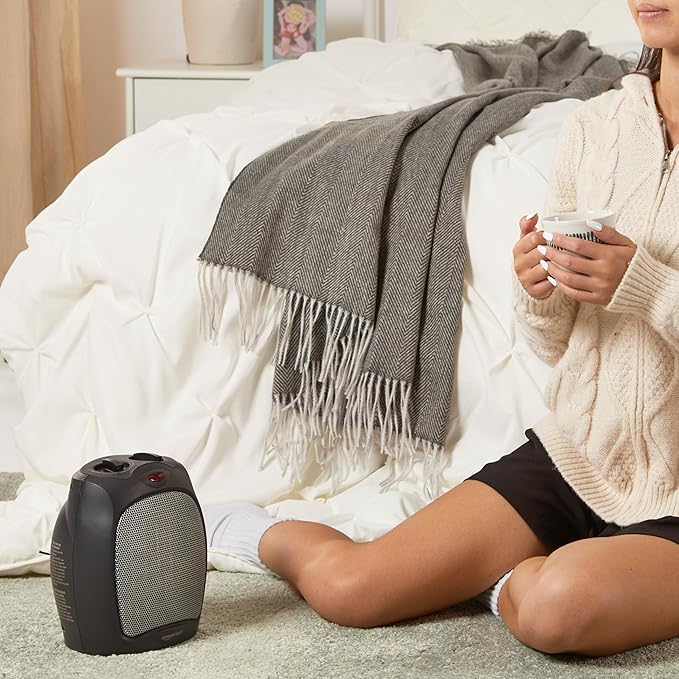 Amazon Basics Ceramic Space Heater, Portable Indoor Heating Solution, With Overheat and Tip-Over Protection, Thermostat, Non-Oscillating, 1500W, 7.52"D x 6.34"W x 9.45"H, Black