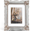 8x10 Vintage Picture Frame with Embossed Flower Design, Silver Ornate Frame for 8x10 or 5x7 Pictures with White Mat, Hand-Crafted Resin Antique Frames for Tabletop & Wall Hanging, Home Decor (Silver)
