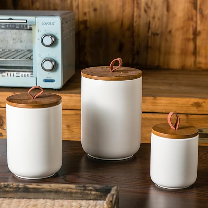 JOJUNO White Ceramic Canister Set with Wooden Lid, 3-Piece Airtight Food Storage Jars for Kitchen Counter - Flour, Sugar, Coffee, Tea, Spice - Small, Medium, Large Sizes