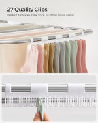SONGMICS Clothes Drying Rack, Foldable 2-Level Laundry Drying Rack, Free-Standing Laundry Airer, with Height-Adjustable Wings, 33 Drying Rails, Sock Clips, Silver and White ULLR053W01V1