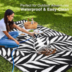OLANLY Waterproof Outdoor Rug 9x12 ft, Reversible Outdoor Plastic Straw Rug with Leaf Pattern, RV Mat, Indoor Outdoor Carpet for Patio, Camping, Balcony, Deck, Backyard, Black & White