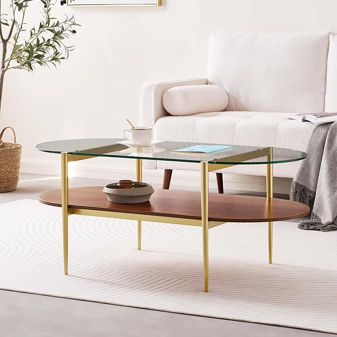 Oval Glass Coffee Table, Mid-Century Modern Design, L41 x W21 x H17 inch, for Living Room, 2-Tier Structure, Clear Glass Top and Walnut Finish Wood Shelf, Conical Legs with Gold Finish Frame