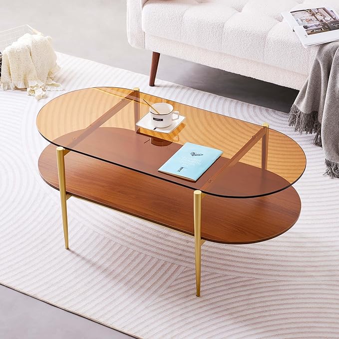 Oval Glass Coffee Table, Mid-Century Modern Design, L41 x W21 x H17 inch, for Living Room, 2-Tier Structure, Amber Glass Top and Walnut Finish Wood Shelf, Conical Legs with Gold Finish Frame
