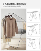 SONGMICS Clothes Drying Rack, with Sock Clips, Metal Laundry Rack, Foldable, Space-Saving, Free-Standing Airer, with 2 Height-Adjustable Gullwings, Indoor Outdoor Use, Silver and White ULLR052W01