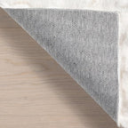 nuLOOM Jeni Solid Faux Rabbit Machine Washable Area Rug, Oval 5' x 7'6", Off-White