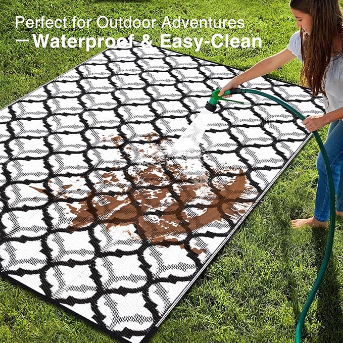 OLANLY Reversible Outdoor Rug 6x9 ft Clearance, Waterproof Outdoor Plastic Straw Rug with Interlacing Pattern, RV Mat for Patio, Camping, Balcony, Deck, Backyard, Black & White